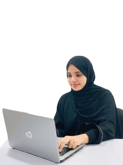 A woman working at a laptop and she representing the best digital marketing freelancer in Kasaragod and she is working with best digital marketing strategies